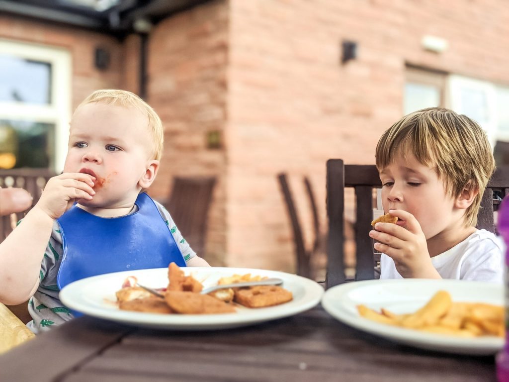 Felix and Dexter eating at Lockards Farm, Dumfries