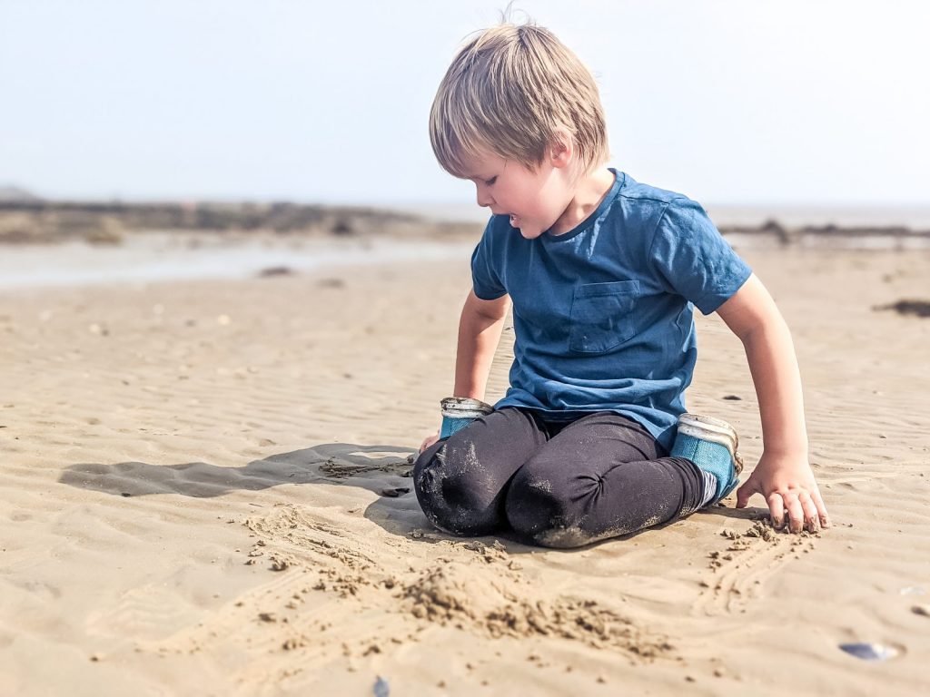 Dexter playing on Southerness beach